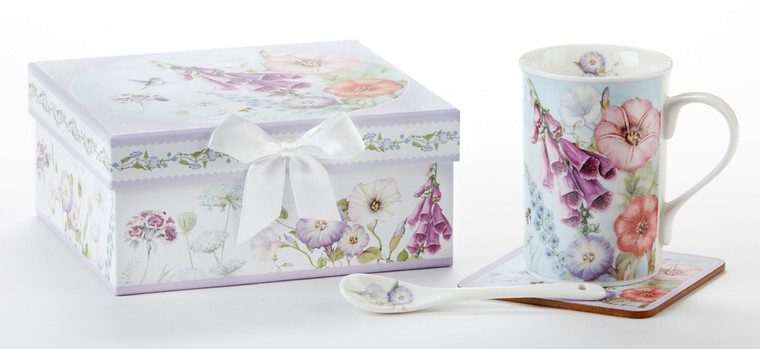 Bell Isle Mug Coaster Spoon Set in Gift Box will brighten anyone's day in its own matching print gift box with matching satin ribbon. The matching coaster is perfect for any spot you leave your cup and the porcelain teaspoon makes tea time all the more special. Gifting Idea: birthday gift, bridal shower, get well, office gift, or thank you.    Includes:  4.9" Porcelain Mug in gift box Matching Coaster Matching Porcelain Teaspoon Dishwasher safe