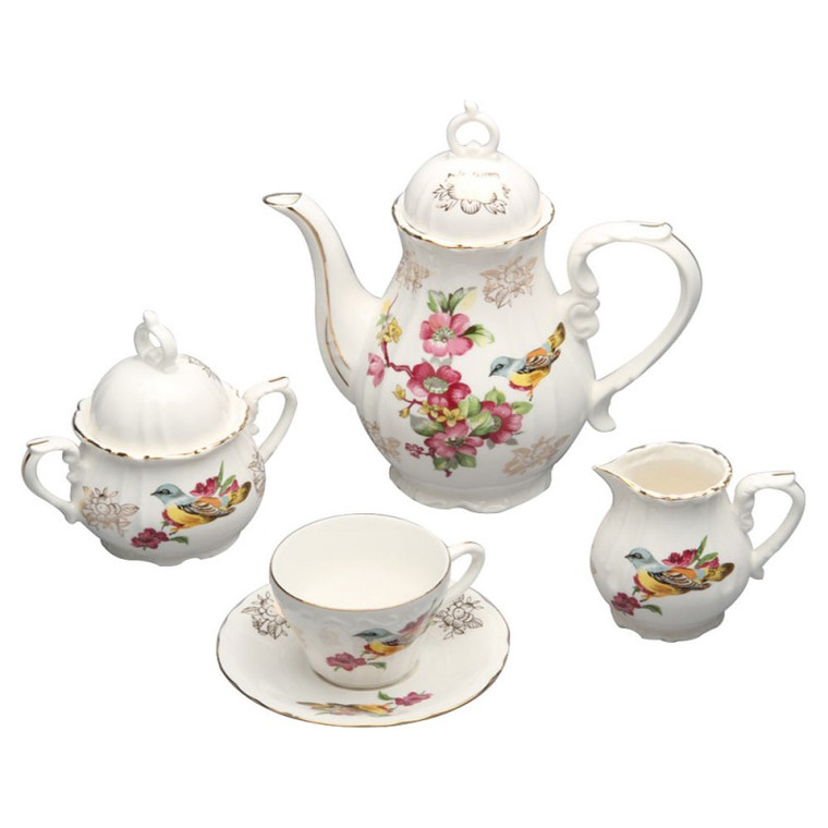 Made of Porcelain. Gold Trimmed 2 cup Teapot. 2 oz Cup. includes one teapot . one of sugar and creamer. 4 of cup saucer. Gift Boxed
