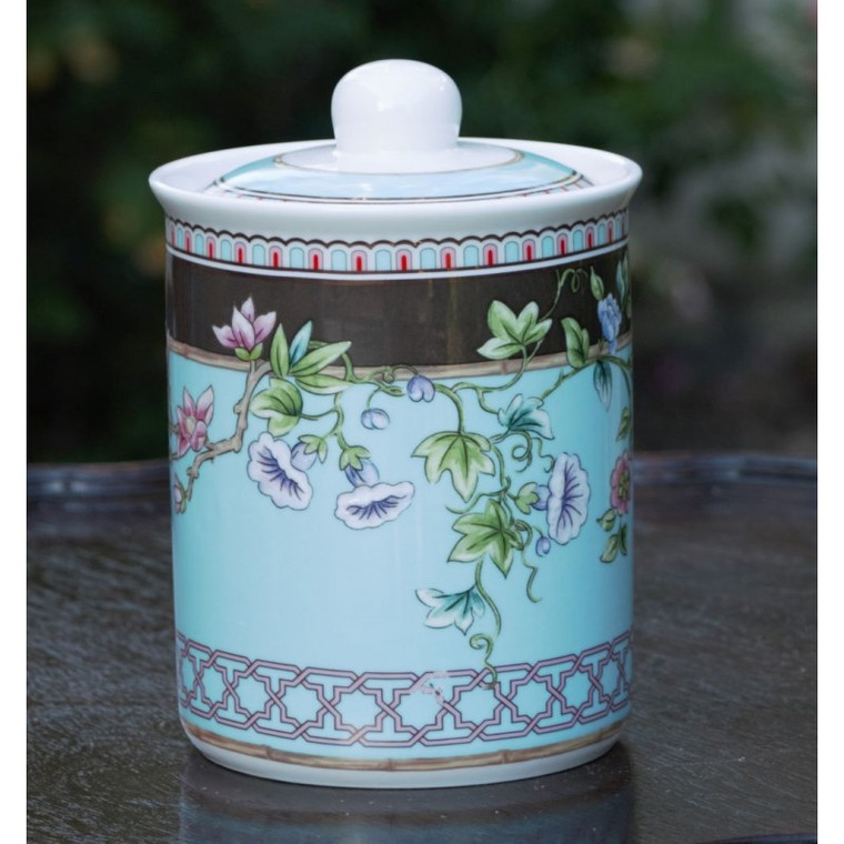 Dream Garden Canister : Porcelain Tea Canister 7.5in Height.  This beautiful porcelain Dream Garden print will bring an extra touch of happiness to your teatime.  Lid is airtight to keep your Tea fresh for full shelf life.   Care: Dishwasher safe