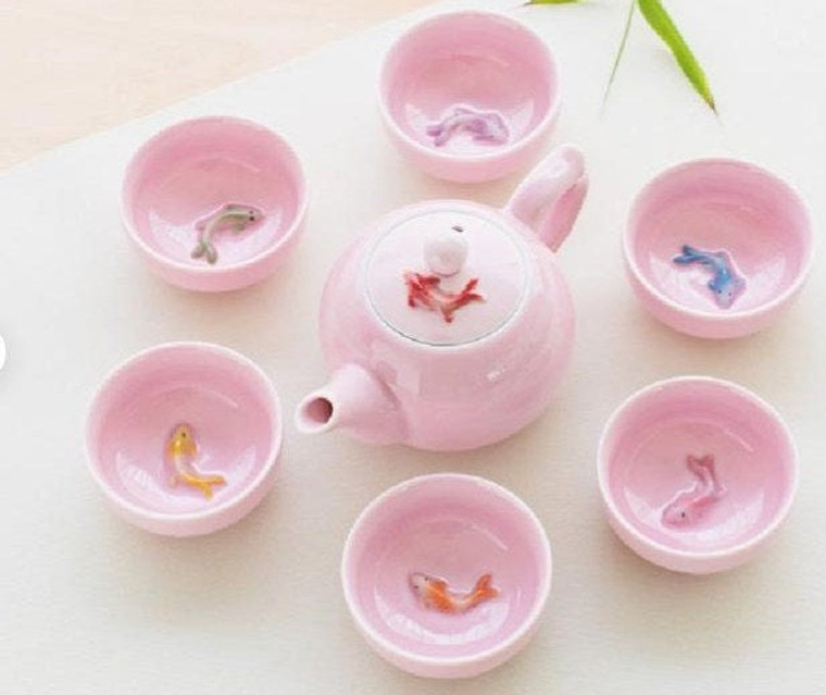 Koi fish design in pink color, brings warm to the household, this tea set not only boasts an aesthetically pleasing Koi fish design in a charming pink color but also emphasizes practicality with its high-quality ceramic material.
Ideal for tea lovers
Suitable for Kungfu tea
Components:
1 teapot
6 cups
Material:
High-quality ceramic
Lead-free
Capacity: Teapot: 200ml, teacup: 45ml
Size:
Teapot: 5.51''x 2.95'' inch
Teacup: 2.55''x1.18'' inch