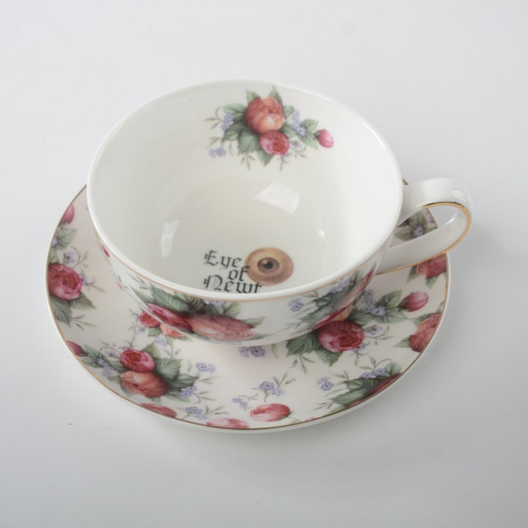 Halloween Eye of Newt Pink Gold Cup Saucers Specifications
Cup Dimension: 4inch
Height x 2.5"
Width x 4"
Depth Capacity - 7.5oz
Saucer Diameter: 6"
Material Porcelain with gold trim

Care Advice
Dishwasher Safe
Hand wash recommended
Not microwave safe due to gold trim


Details
Made in China