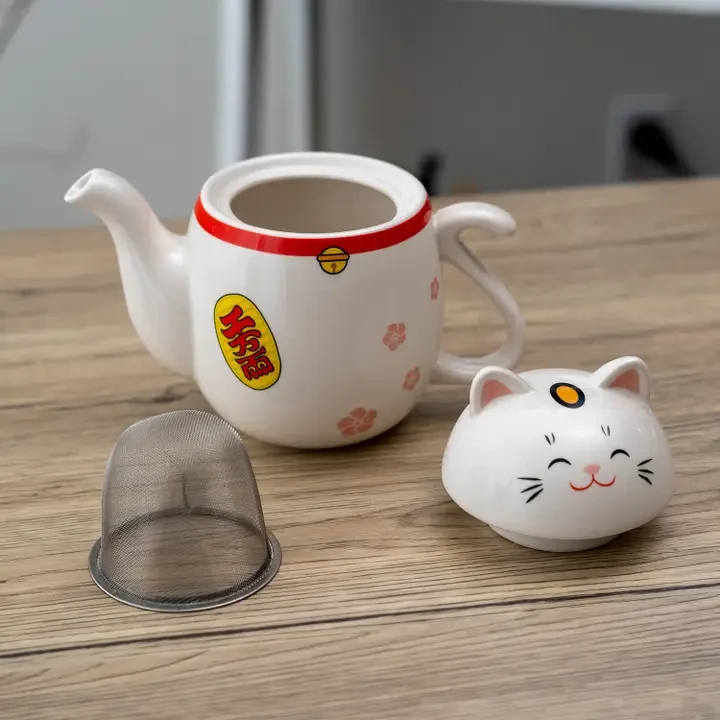 • Size: 6"H
• Capacity: 22 fl oz
• Material: Ceramic with Stainless Steel Strainer
Ceramic; Stainless Steel
