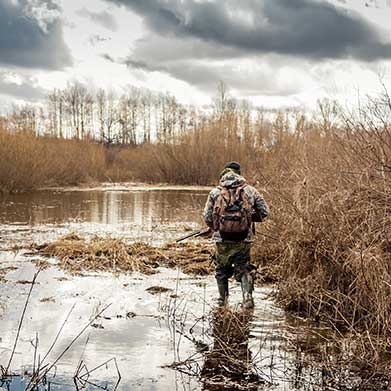 man hunting in water