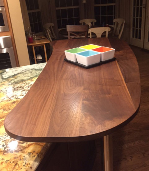 wide plank walnut countertop with everlast varnish finish by armani fine woodworking