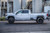 Picture of a DDC The Ten Forged Wheels Gloss Black with Tires on a Chevy 3500 Dually
