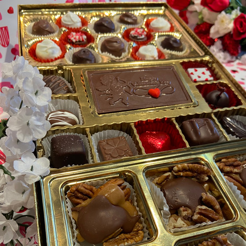 1.5 lbs of chocolate bliss-a variety of our homemade chocolates that include red velvet truffles , sea salt caramels, pecan fiddlers, and a Valentines greeting card