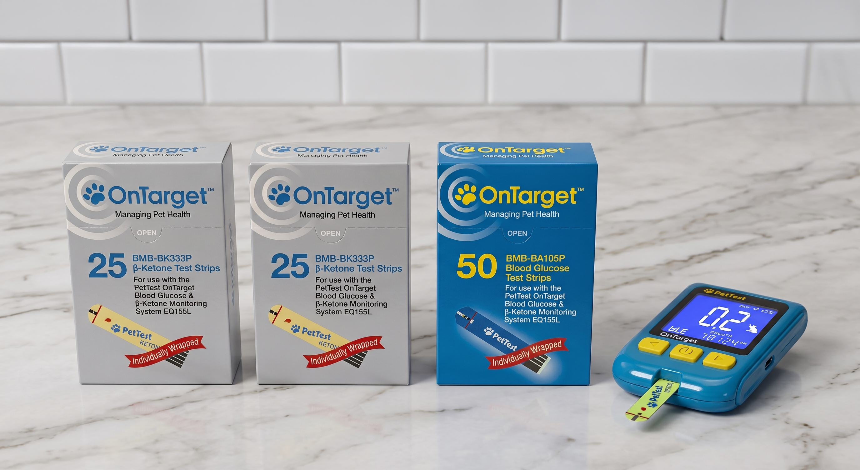 OnTarget blood glucose and beta-ketone test strip boxes beside the OnTarget meter