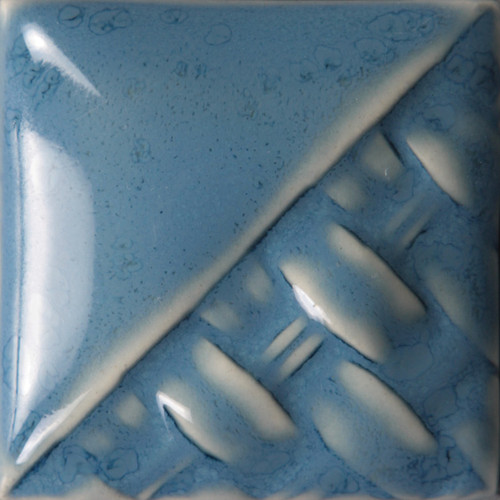 Cone 6: Blue Opal is a medium blue semi-transparent to fully opaque gloss glaze. Thinner applications create a transparent blue haze; thicker coatings produce an
opaque finish. Surface textures can cause the glaze to collect and produce streaks of greyish blue.

Cone 10: Becomes more transparent. Can produce red mottling in a heavy reduction.

TIP: Light applications on brown and buff bodies will produce a transparent green-blue gloss finish. Thinner application will provide a glossy transparent finish. Thicker application will provide light blue floating. Surface decoration will be visible under the glaze, but if you apply the glaze thick, it could blur your image.