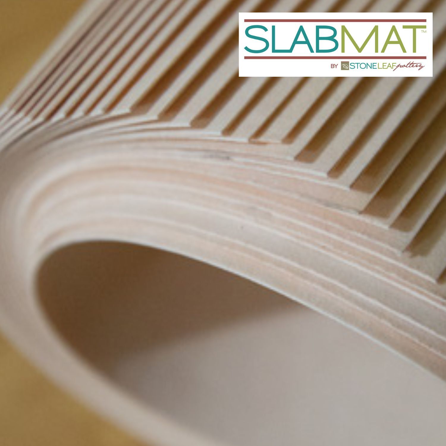 SlabMats curled over to show stiffness vs flexibiity