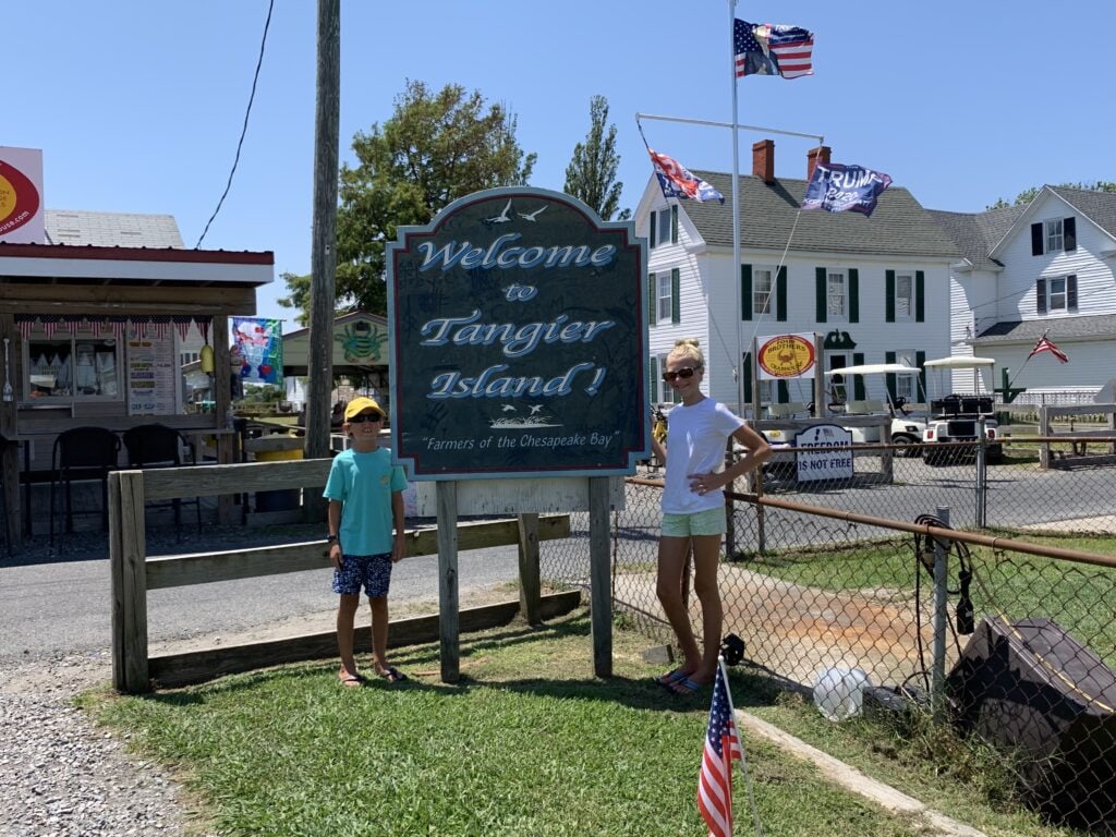 The Welcome to Tangier Island sign near the dock.