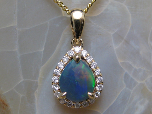 black opal diamond halo pendant