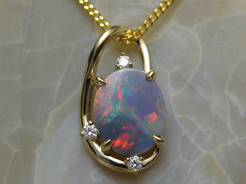 black opal pendant with red fire