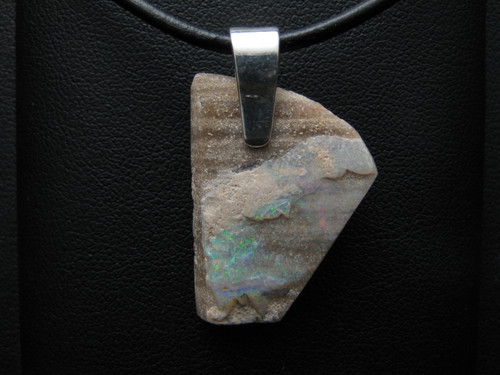 Rough opal pendant on leather strap