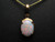 white opal pendant in rose gold
