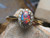 black opal engagement ring