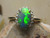 black opal diamond halo ring for engagement