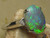black opal ring in 14k white gold