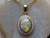 opal diamond halo pendant
