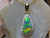 black opal diamond halo pendant