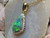 black opal diamond halo pendant