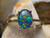 Opal and diamond ring