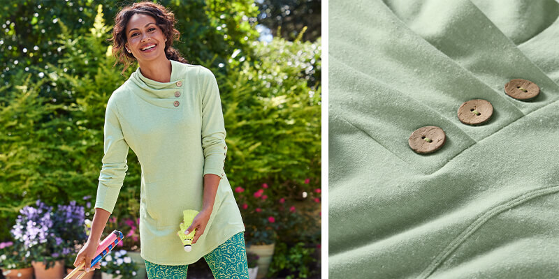 Image of a woman playing badminton while wearing the green Brinley French Terry Tunic
