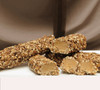 A delicious divinity nougat center covered in rich, creamy caramel, and rolled in fresh pecans. 