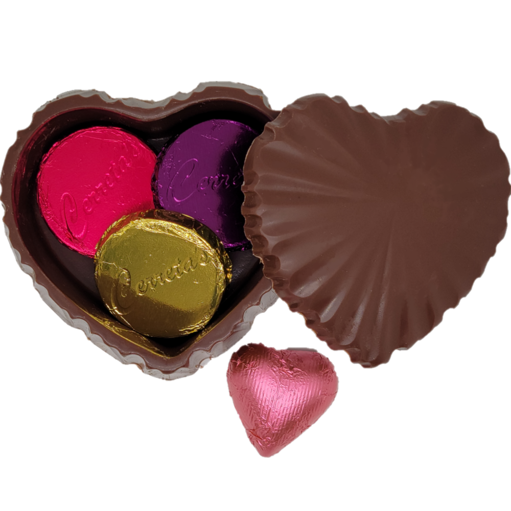 Enjoy this Beautiful Milk Chocolate Heart Shaped Jewelry Box filled with elegant Milk and Dark Chocolate pieces! You can also add your own special surprise in the box for that special someone in your life. 