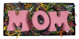 Pink Pastel Chocolate shaped into MOM letters in a Festive Box