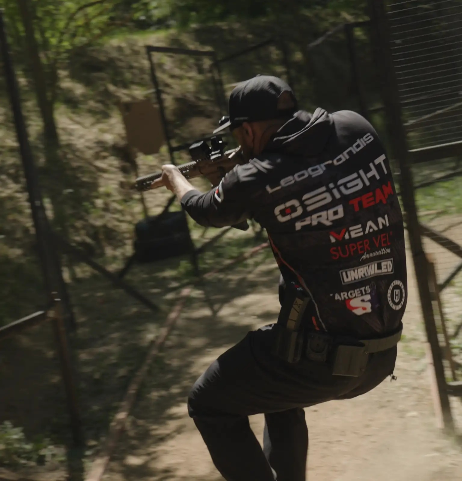 Max Leograndis competing on a wooded shooting stage