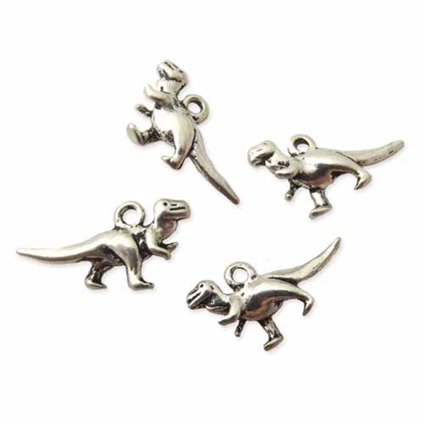 4 Dinosaur charms, silver colour