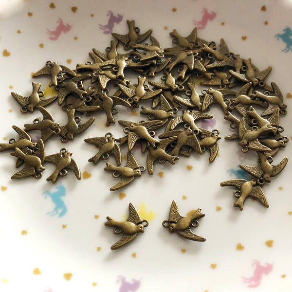 20 x bird swallow antique bronze connector charms