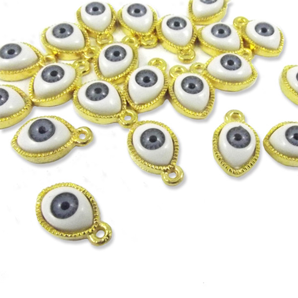 4 gold colour blue eye charms