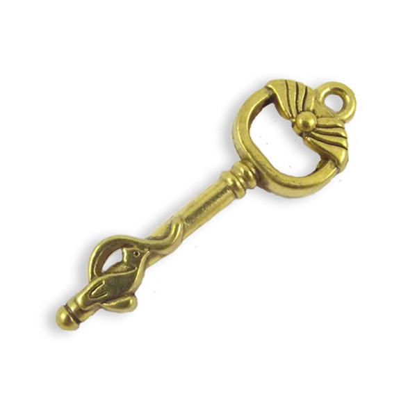 2 x art deco style key charms, gold colour