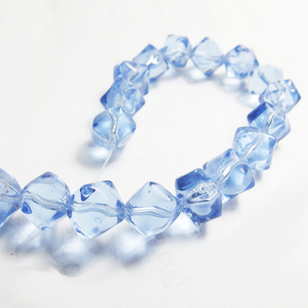 Blue transparent uneaven cube string of glass beads