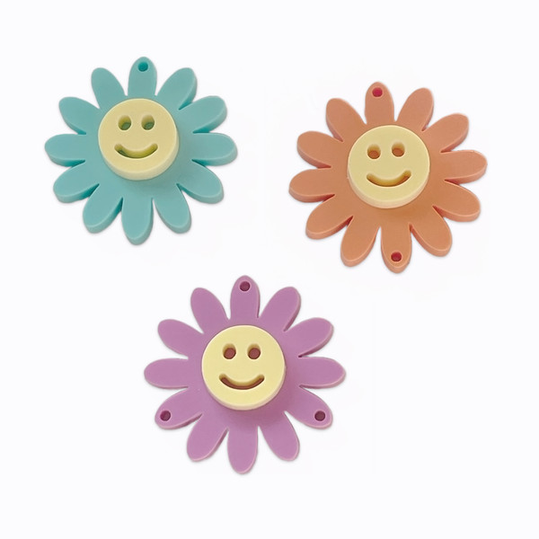 12 point flower smiley face charm