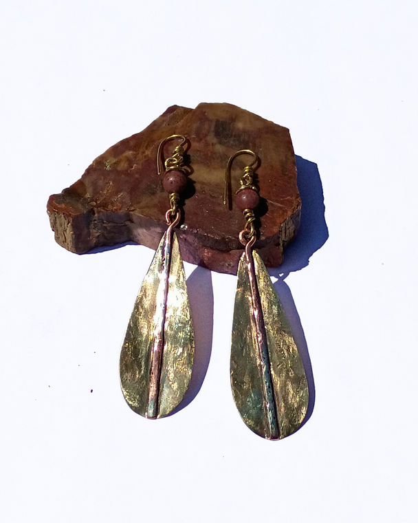 Two and half inch brass earrings.