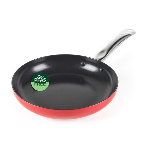Red non-stick frying pan with silver handle, PFAS free badge visible