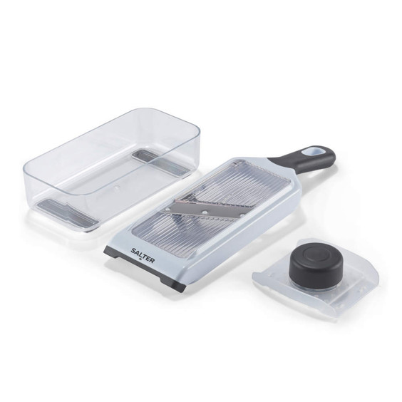 White and black handheld food slicer with container, shown from above.
