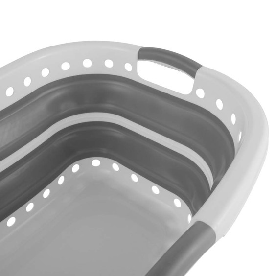 Collapsible grey and white laundry basket shown from above