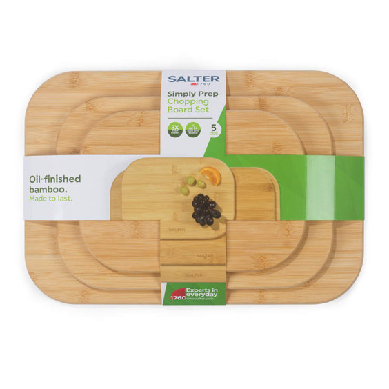 Set of oil-finished bamboo chopping boards in three sizes, packaged for sale.