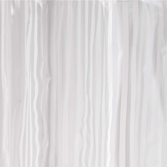 White striped shower curtain hanging on chrome rings