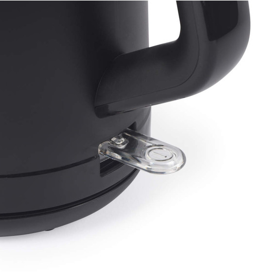 Close-up of black electric kettle power switch and handle