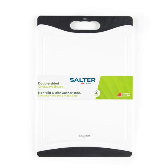 White double-sided plastic chopping board with black trim and Salter branding