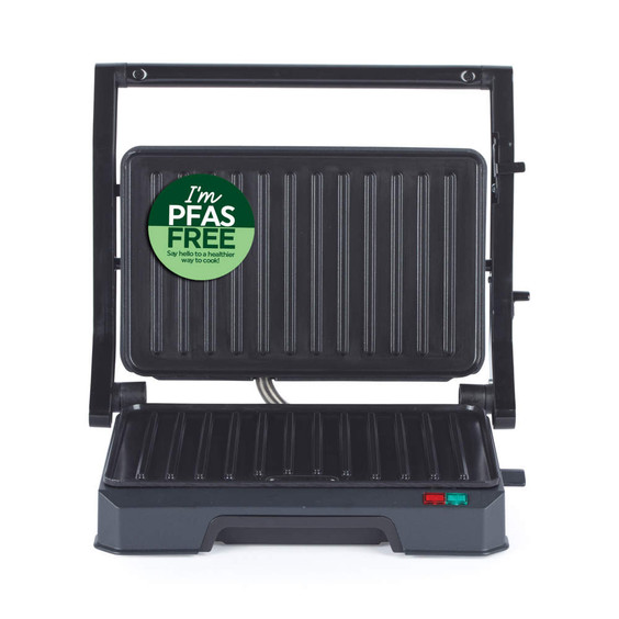 Black electric grill with open lid, PFAS free sticker visible, for healthy cooking.
