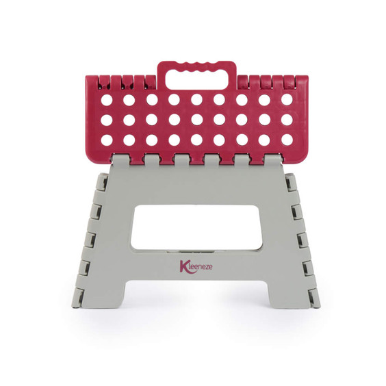 Grey folding step stool with pink handle and top, Kleeneze logo visible on side.