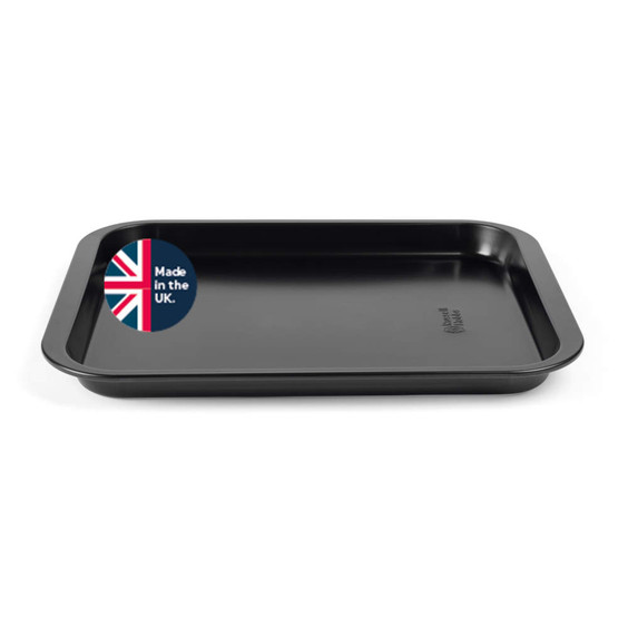 Non-stick black roasting tin with 'Made in the UK' badge, shown empty.