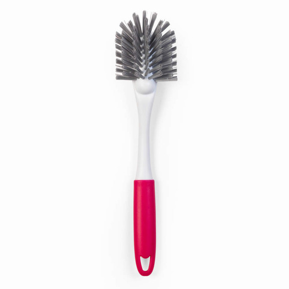 Dish brush with angled grey bristles and pink handle, shown on white background