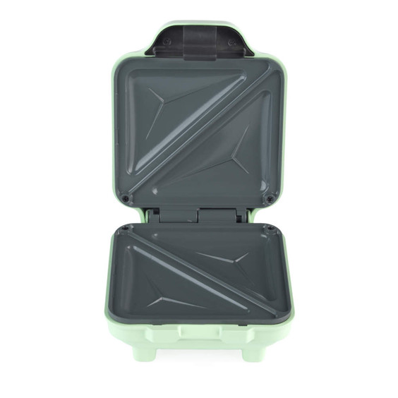 Green sandwich maker with open plates, shown from above