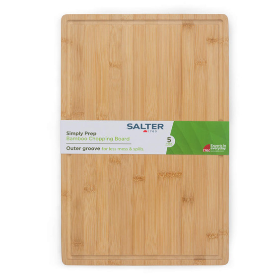 Rectangular bamboo chopping board with outer groove, light wood, packaging visible